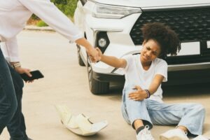 A woman crosses the street. A San Jose pedestrian accident lawyer can help you after an accident.