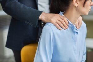 Coercion is sexual assault. Like this male touching a female coworker on the shoulders.